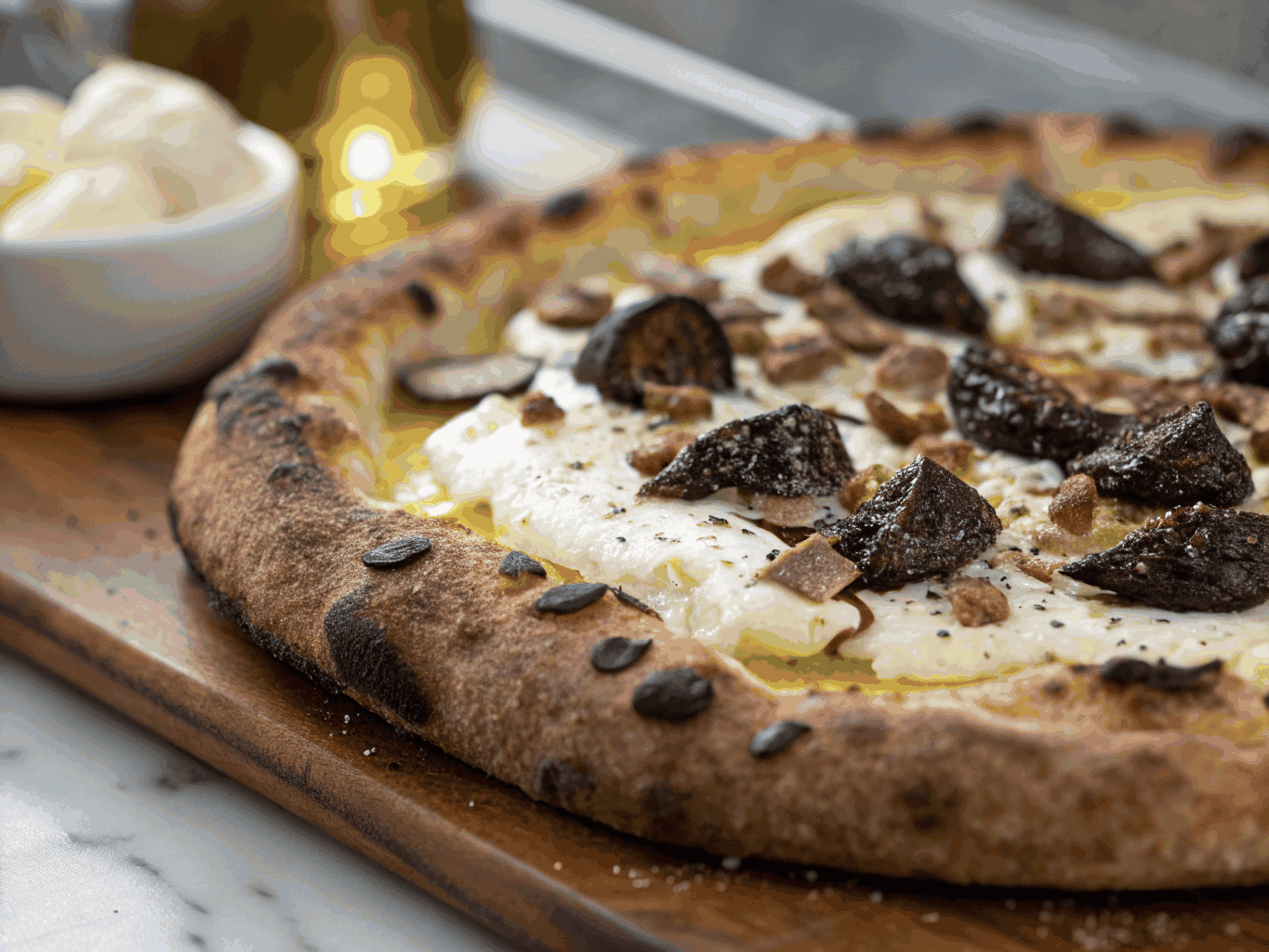 Artisanal black truffle pizza with wild mushrooms